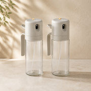 Two Noruva 550 ml warm gray oil sprayers