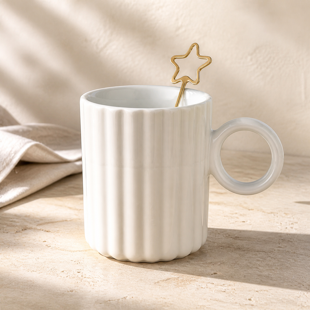 Noruva Form ivory fluted ceramic petal mug with gold star spoon