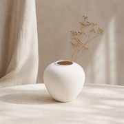 Noruva sculptural ceramic vase in a warm neutral interior